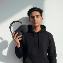 gadpods-max-premium-wireless-headphone-in-model's-hand.webp